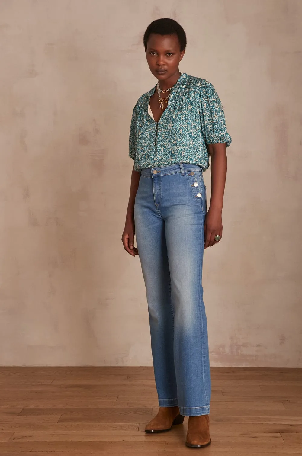 NINON USED-LOOK STONEWASHED FLARED DENIM JEANS